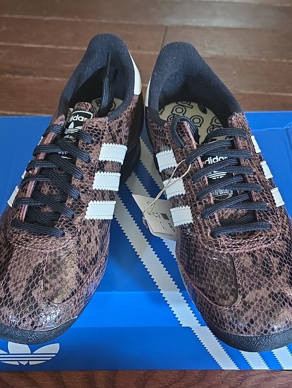 adidas Women’s Brown Snake-Print Sneakers with White Stripes